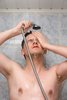 man taking shower man taking shower